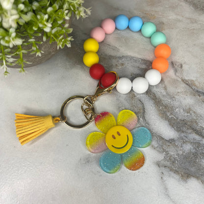 Silicone & Acrylic Bracelet Keychain - Daisy - Rainbow